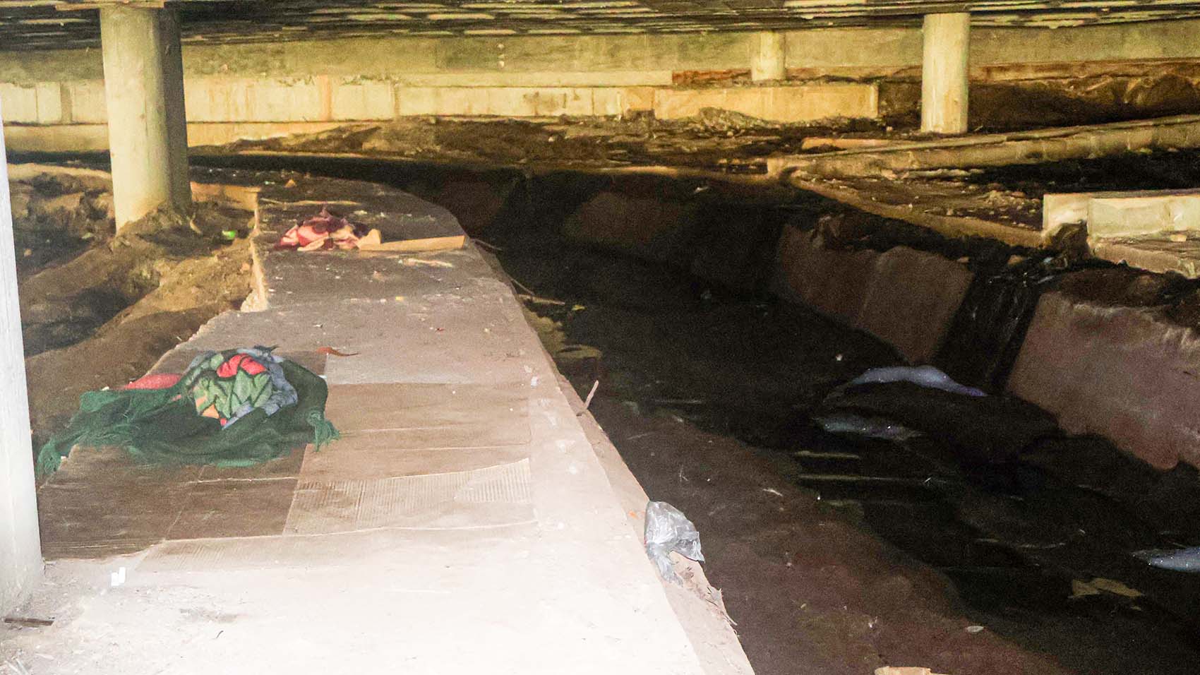 Old and worn-out blanket, foam mattresses and cardboard can be found beneath the building where the children sleep and is a water drainage, which is said to be full of mosquitoes. (Pics: Khaya Simelane)